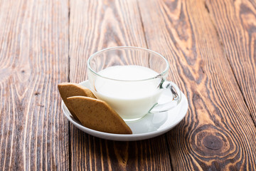 Shortbread cookies and cup of milk