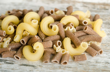 Raw pasta on the table