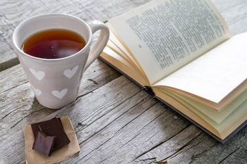 Lifestyle - tea chocolate and book