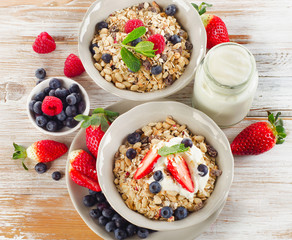 Healthy Breakfast with ripe  berries, yogurt  and  muesli.