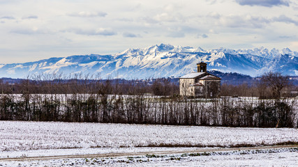 snow on an ancient church of italy