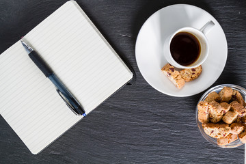 Business break - coffee cookies and notepad