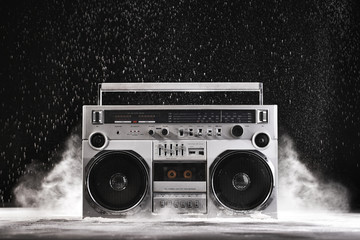 1980s Silver Retro ghetto blaster and dust isolated on black wit - obrazy, fototapety, plakaty