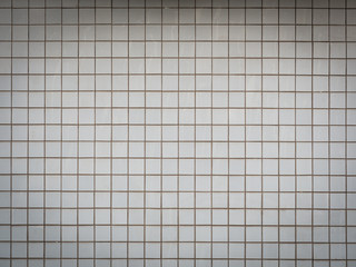 Square patterned brick wall