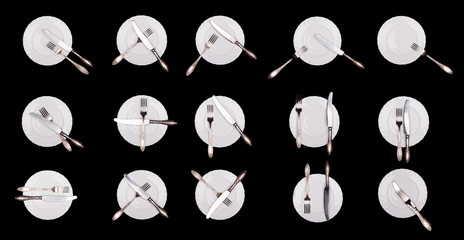 Set of etiquette signs: plate, knife, fork isolated on black