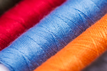 Multicolor sewing threads. close up. macro