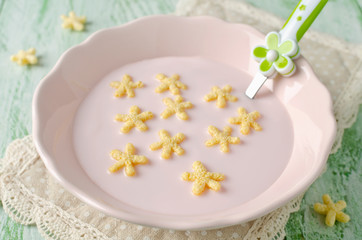 Obraz na płótnie Canvas Yogurt with corn stars