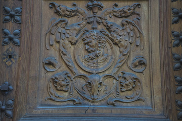 doorknob, old wooden door with carvings