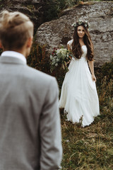 beautiful fabulous happy  bride with bouquet and wreath and styl