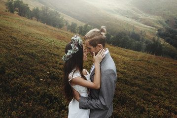 beautiful fabulous happy  bride and stylish groom on the backgro