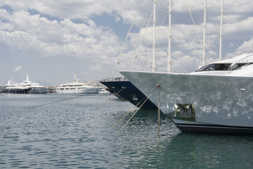 Naklejka premium Luxury yachts in marina, docked on the pier