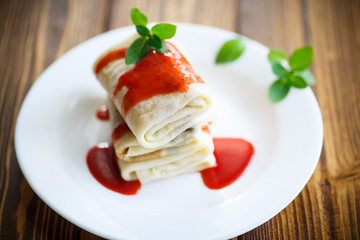 sweet pancakes with strawberry jam