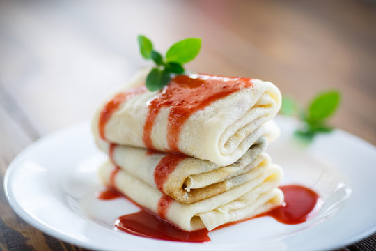 sweet pancakes with strawberry jam