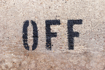 OFF letters on the marbel wall