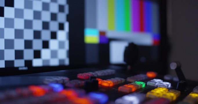 Hand Pulling The T-Bar On A Video Switcher