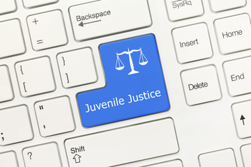 White conceptual keyboard - Juvenile Justice (blue key)
