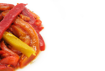 Close up of roasted peppers on white background