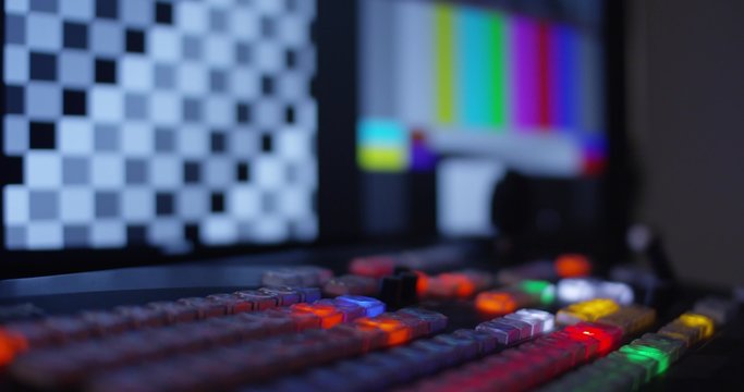 Hand Pulling The T-Bar On A Video Switcher