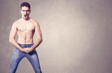  nerd with muscles on grey background