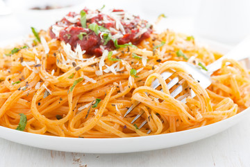 pasta with tomato sauce and parmesan cheese, close-up