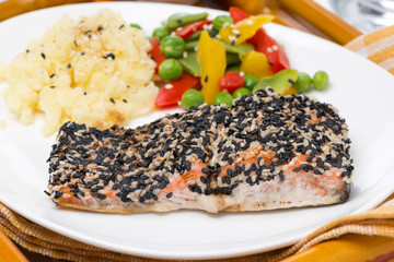 salmon in sesame breaded, vegetables and mashed potatoes