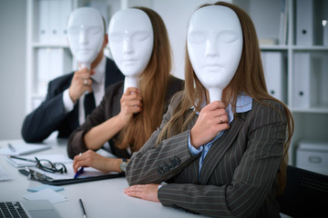 Group of business people  at meeting. Business people hide their emotions under the mask of confidence during the negotiations , business concept - obrazy, fototapety, plakaty