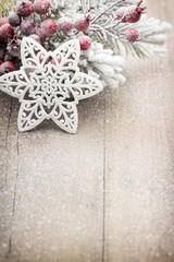 Christmas decoration over wooden background.