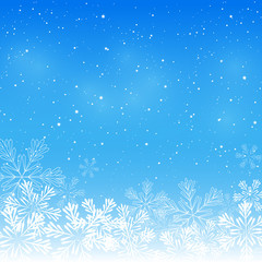 Fototapeta na wymiar Christmas snowflakes on blue background 