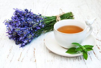 Cup of tea and lavender flowers