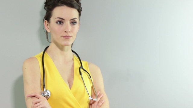 Young female doctor looking stern and concerned