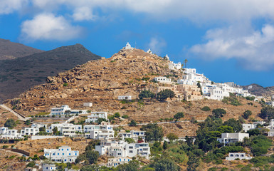 Fototapeta na wymiar Chora - The hill with the chapels in Chora town on the Ios islan