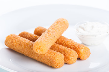 Fototapeta na wymiar Crispy cheese sticks deep-fried on a white background