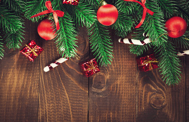 Fototapeta na wymiar Christmas Decoration Over Wooden Background. Vintage