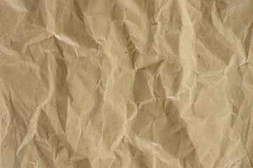 Brown wrinkled kraft paper. It is used for background and texture.