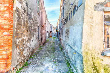 narrow alley of ancient buildings