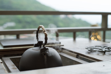 Steaming kettle at traditional Chinese tea house