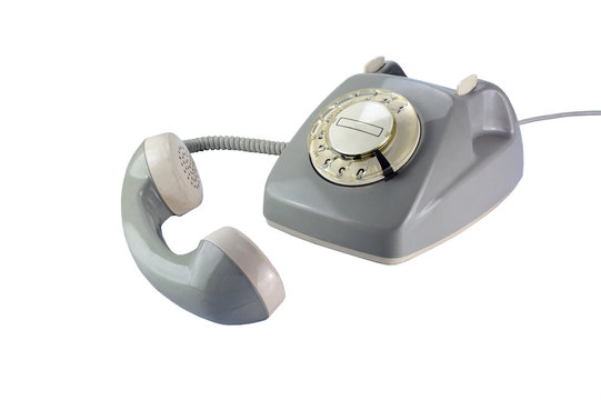 gray rotary dial phone with removed telephone receiver isolated