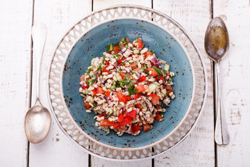 Salad with pearl barley and vegetables.selective focus