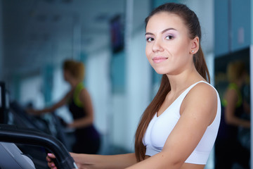 pretty girl training at the gym