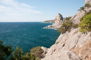 Fototapeta na wymiar Black Sea coast and Swan Wing rock near Simeiz, Crimea