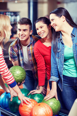 Fototapeta premium happy friends in bowling club