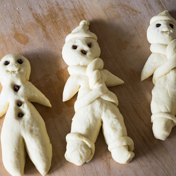 Unbaked traditional man-shaped bread prepared for St Nicholas day in german-speaking countries