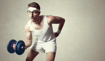 young nerd try to lift weights