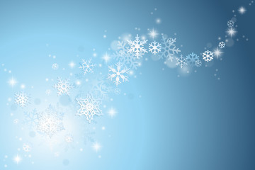 Christmas winter background with swirl of snowflakes on blue