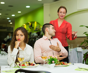 Dissatisfied visitors in restaurant
