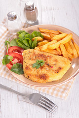 plate with cordon bleu and french fries