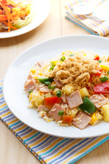 Thai food fried rice with ham, and pineapple.
