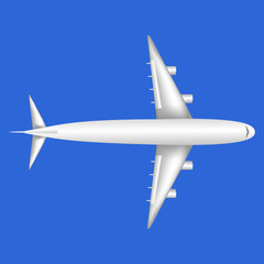 Overview of a large white jumbo jet airliner airplane on a blue sky background.