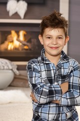 Portrait of happy little boy at home