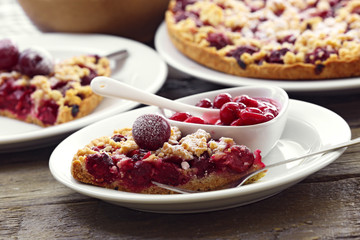 Tasty homemade pie with cherries on table close up
